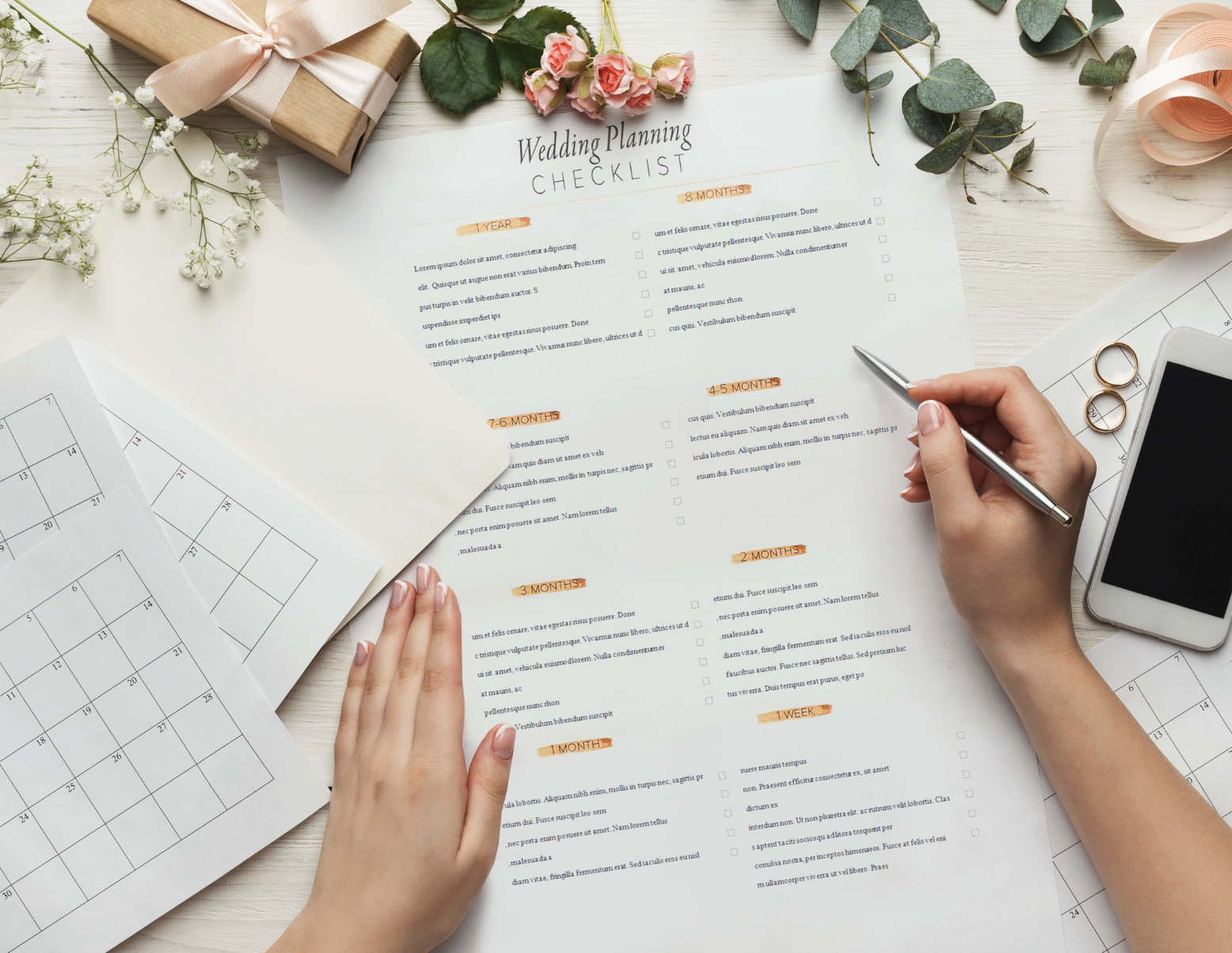 Wedding planner going over the wedding timeline